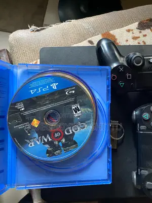 Neatly Used PS4 Slim With Free Cracked USB + Two Pads + Free CD