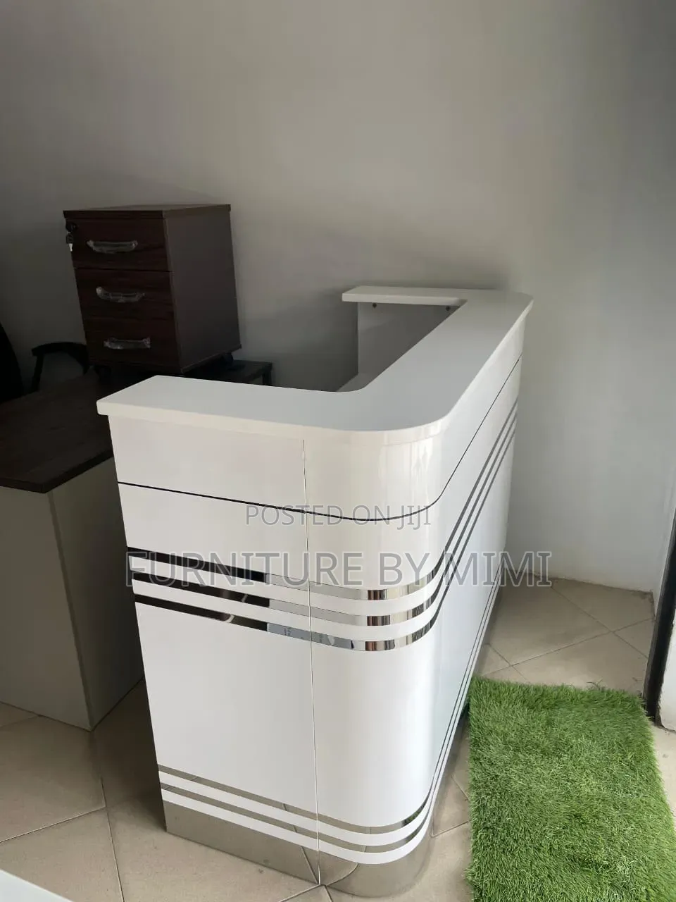 Modern High-Gloss White Reception Desk With Silver Stripe Accent