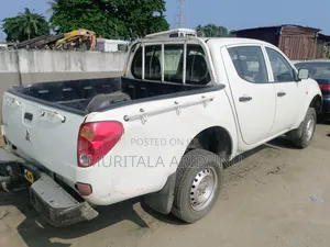 Mitsubishi L200 2011 White