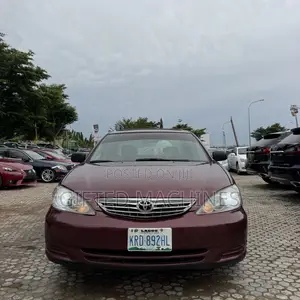 Toyota Camry LE 4dr Sedan (2.4L 4cyl 5M) 2003  Red 