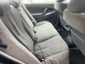 Toyota Camry Base 4dr Sedan (2.5L 4cyl 6M) 2010 Gold