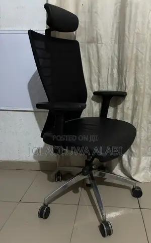 Ergonomic Chairs and Roller Window Blind