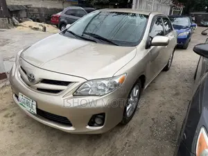 Toyota Corolla LE 4dr Sedan (1.8L 4cyl 4A) 2012 Gold