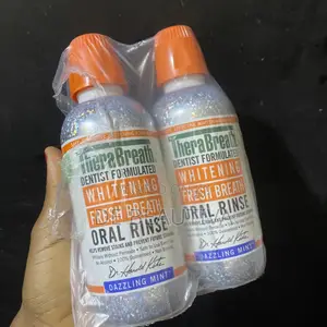 TheraBreath Whitening Fresh Breath Oral Rinse in Dazzling Mint Flavor