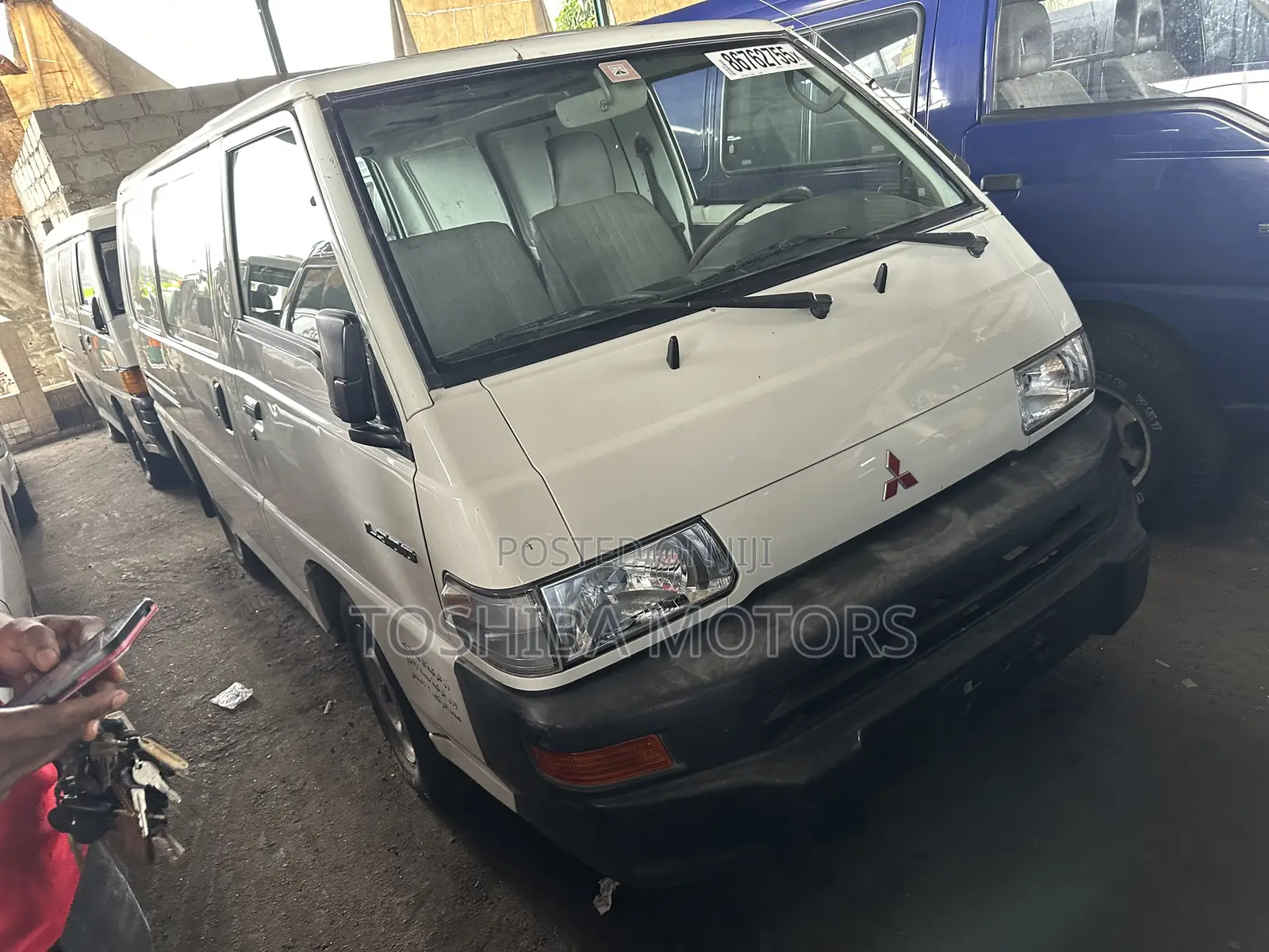 Mitsubishi L300 2004 White