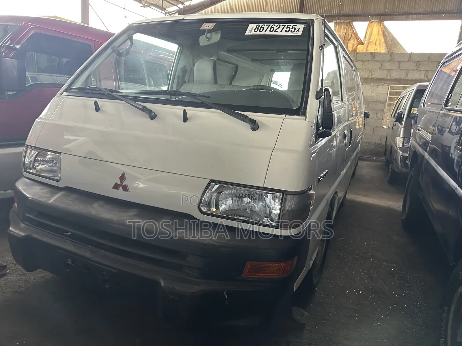 Mitsubishi L300 2004 White