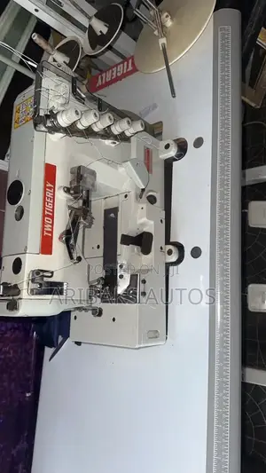 Two Tigerly Tapping Machine