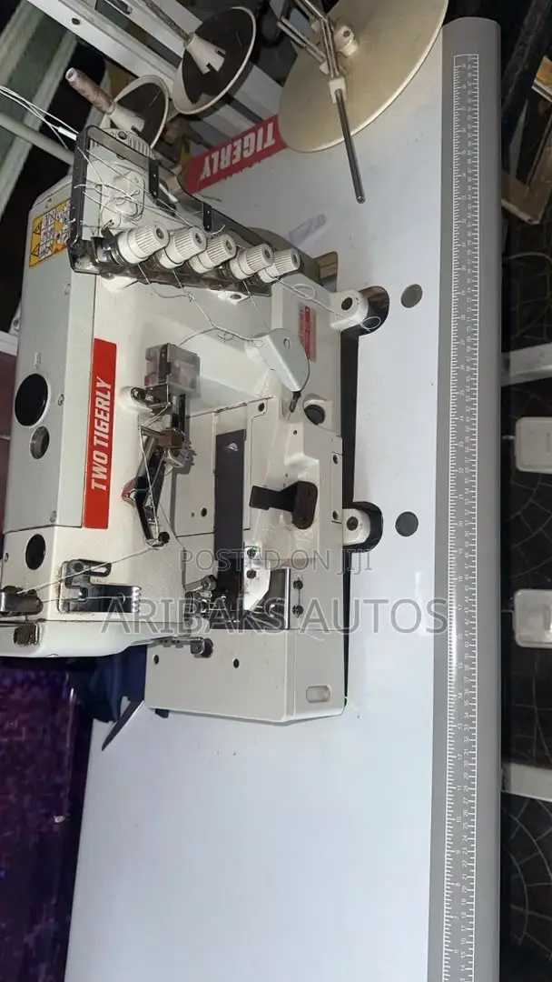 Two Tigerly Tapping Machine