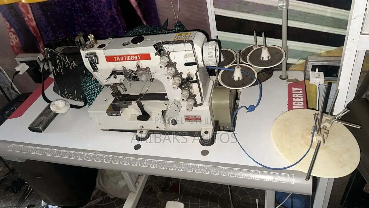 Two Tigerly Tapping Machine