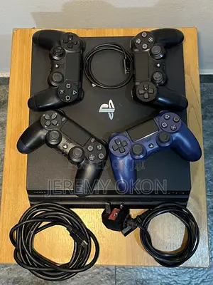 1TB Playstation 4 Pro With 4 Controllers USB Charging Cable