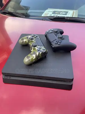 PS4 Slim With 2 Pads and 6 Games