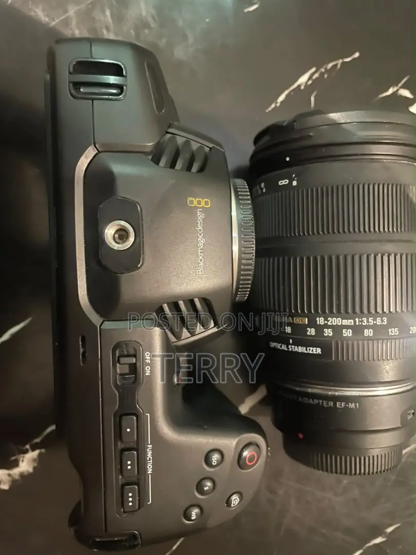 Black Magic Camera With Adapter and Lens