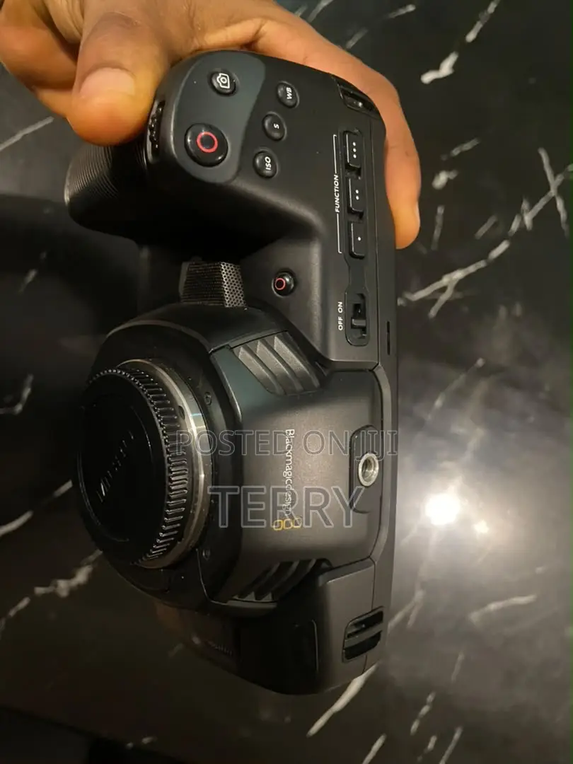 Black Magic Camera With Adapter and Lens