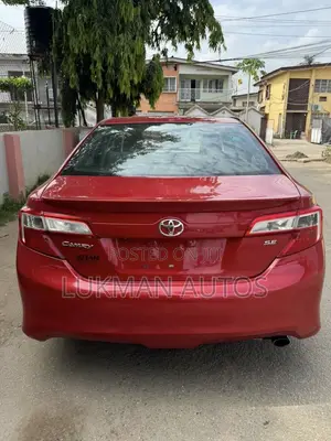 Toyota Camry SE 4dr Sedan w/Prod. End 11/13 (2.5L 4cyl 6A) 2014 Red