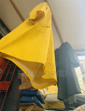 Waterproof Gown PVC Raincoat in Suitable for Rainy Conditions.