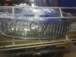 Dront Grill Corolla 2003