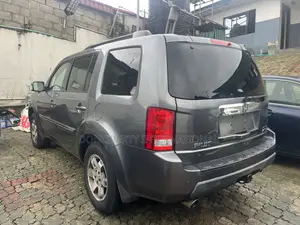 Honda Pilot Touring w/RES/Navi 4WD (3.5L 6cyl 5A) 2011 Gray