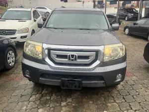 Honda Pilot Touring w/RES/Navi 4WD (3.5L 6cyl 5A) 2011 Gray