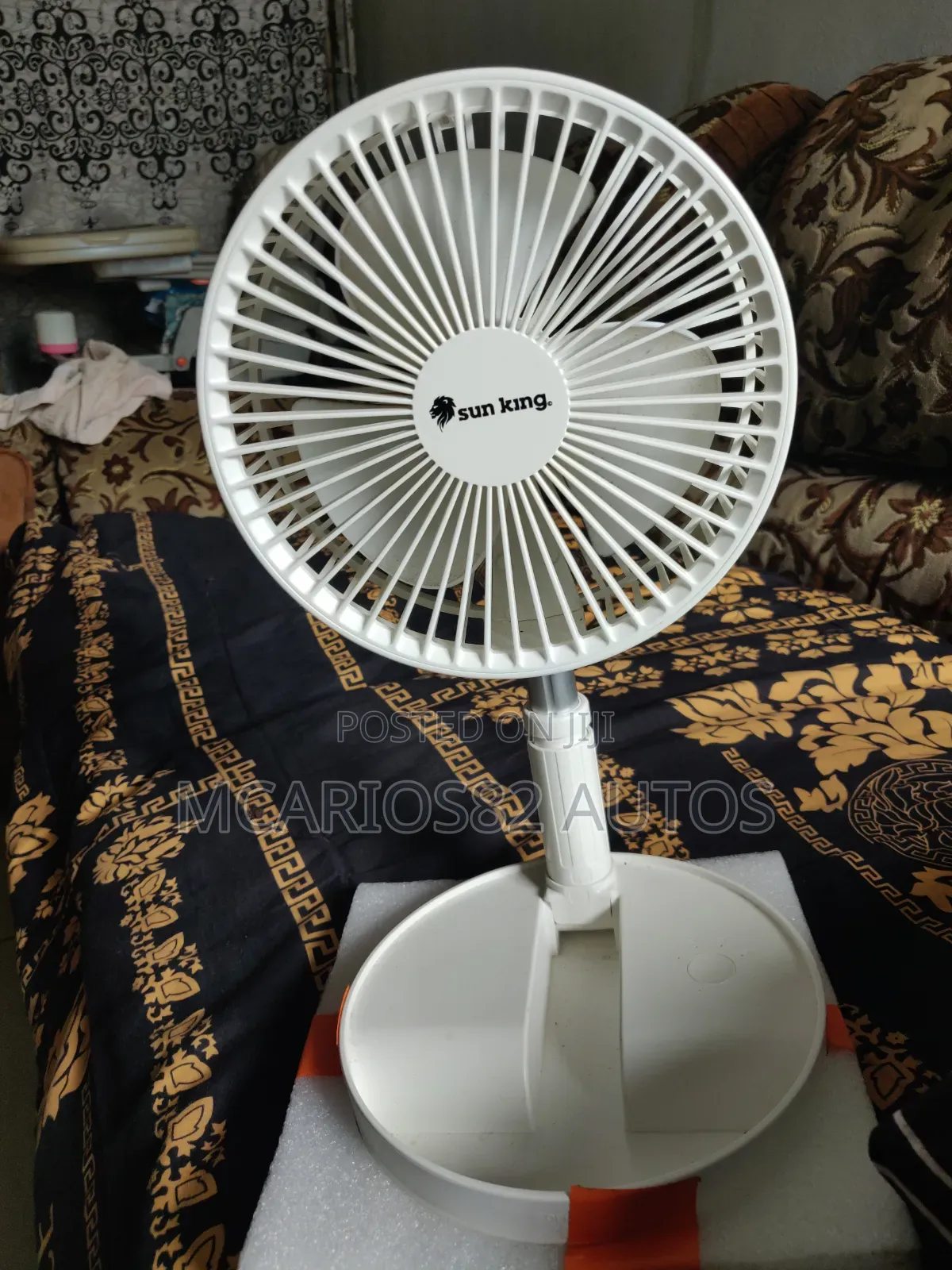 Sun King Foldable Fan
