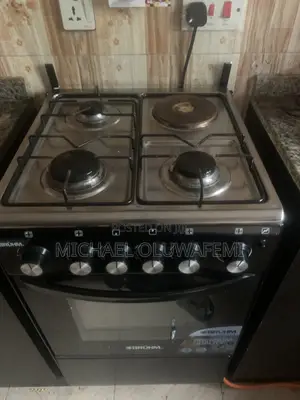Neatly Used Bruhm Gas Cooker + 12.5kg Cylinder (With Gas Inside)