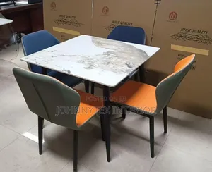 Dining Table With Four Sitters Is Available