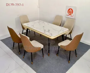 Quality and Imported Marble Top Dining Table by 6 Chairs