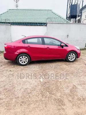 Kia Rio EX 4dr Hatchback (1.6L 4cyl 6A) 2013 Red