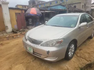 Toyota Camry LE 4dr Sedan (2.4L 4cyl 5M) 2003 Gold