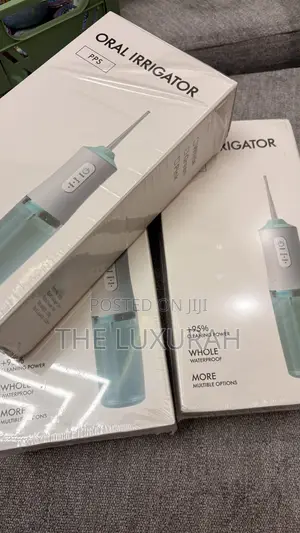Dental Irrigator + Free Colgate Mouthwash ( Water Flosser ) 220ml