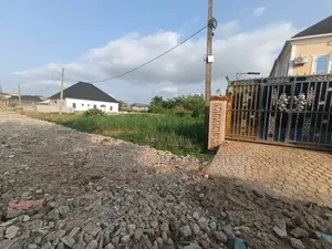 More Than Half Plot of Land in a Very Decent Area Close Not Too Far Fr