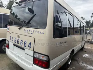 Toyota Coaster 2019 Gold