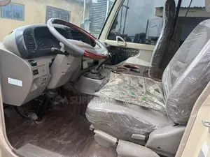 Toyota Coaster 2019 Gold