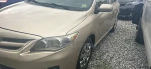 Toyota Corolla L 4dr Sedan (1.8L 4cyl 5M) 2013 Gold