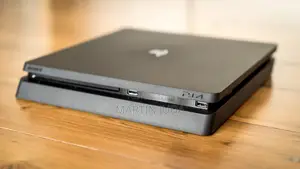 Ps4 Slim With One Used Controller and 3plusgames Fc24, Mk11, Watchdog