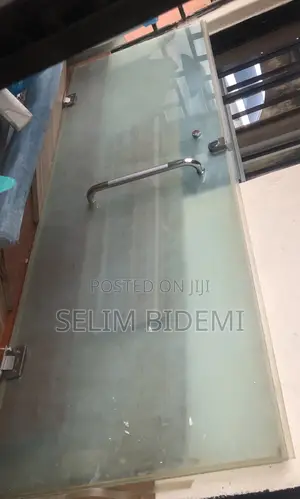 Doors and Security Neatly Used Glass. Door for Office and Rest Room