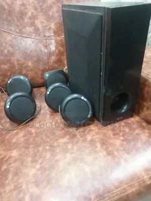 LG Woofer With 5 Small Speakers