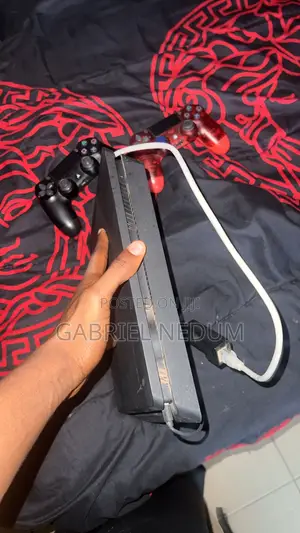 Neatly Used Play Station 4, With 2 Pads (Hacked) Slim