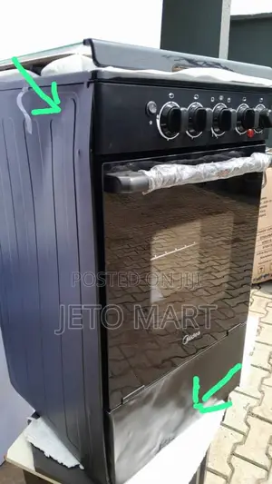 Midea Standing Cooker 3 Gas, 1 Electric 
Dented at the Sides