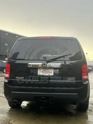 Honda Pilot Touring w/RES/Navi 4WD (3.5L 6cyl 5A) 2010 Black