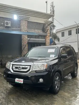 Honda Pilot Touring w/RES/Navi 4WD (3.5L 6cyl 5A) 2010 Black