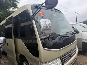 Toyota Coaster 2018 Gold