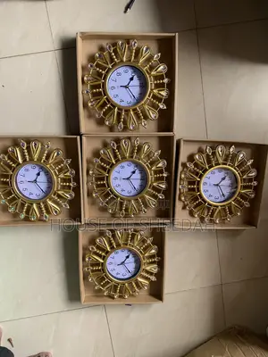 A Decorative Gold Sunburst Clock