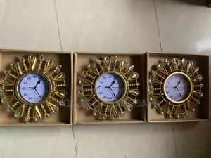 A Decorative Gold Sunburst Clock
