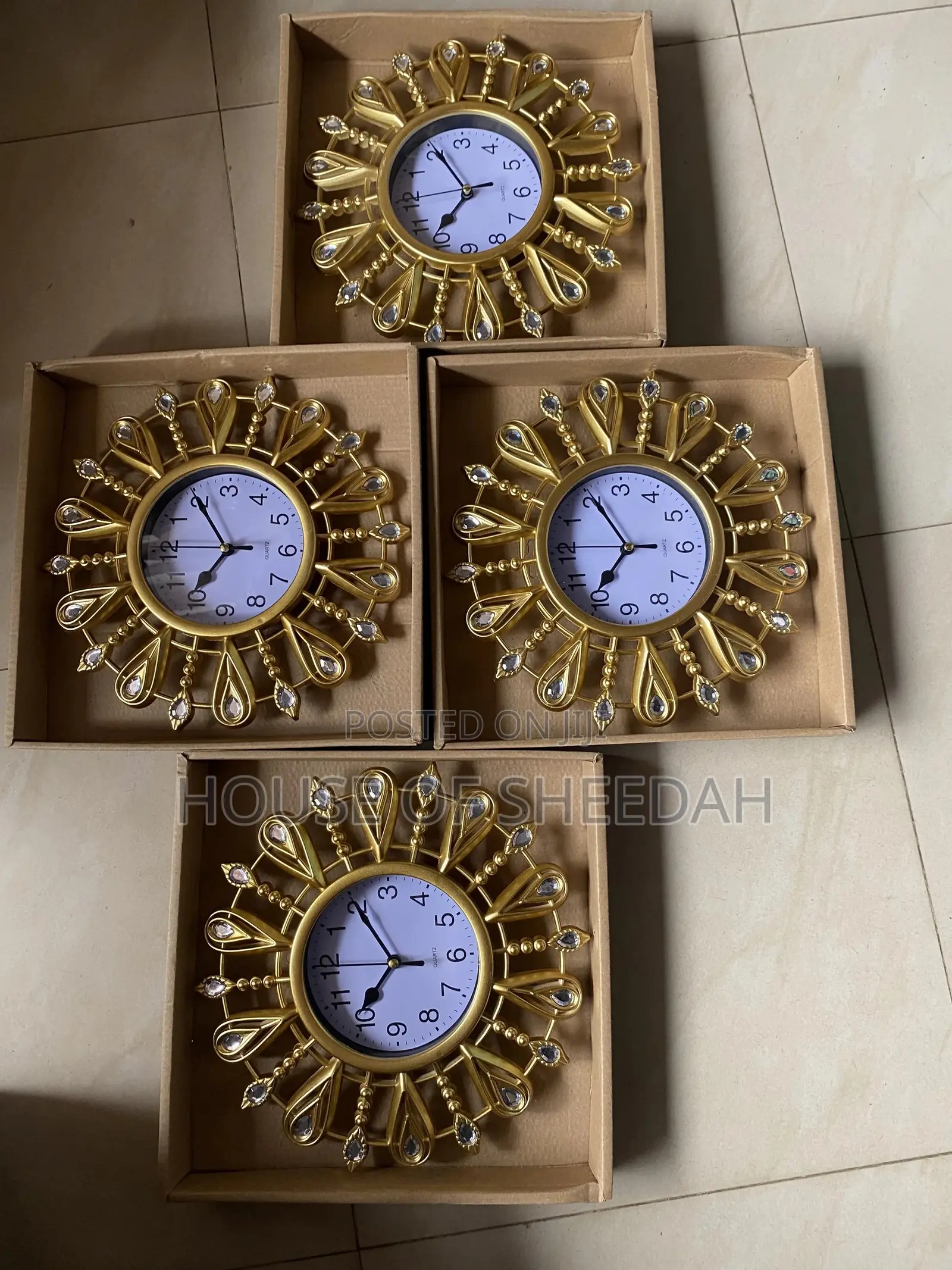 A Decorative Gold Sunburst Clock