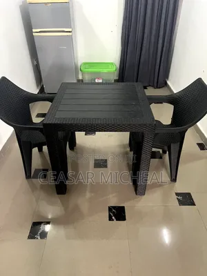 A Rattan Wicker Outdoor Lounge Table and 2 Chairs