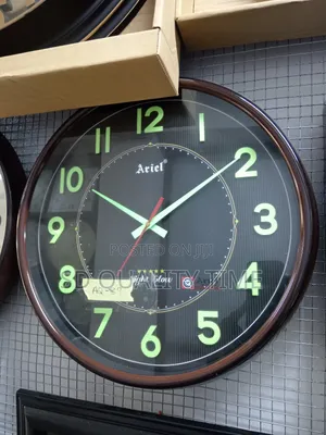 Ariel Night Glow Wall Clock