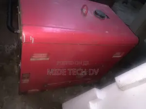 BDE6700T3 Diesel Generator Is a Red, Soundproof Unit Labeled "Silent".