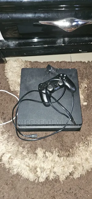 Playstation 4 Slim, With 1 Pad, Two Games Installed, Not Hacked