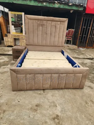 Neatly Padded 4.5by6 Bed With Cupboard