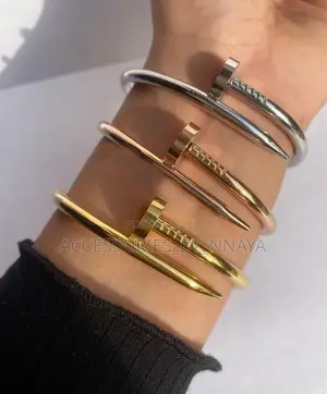 Silver, Gold and Rose- Gold Cartier Bangles